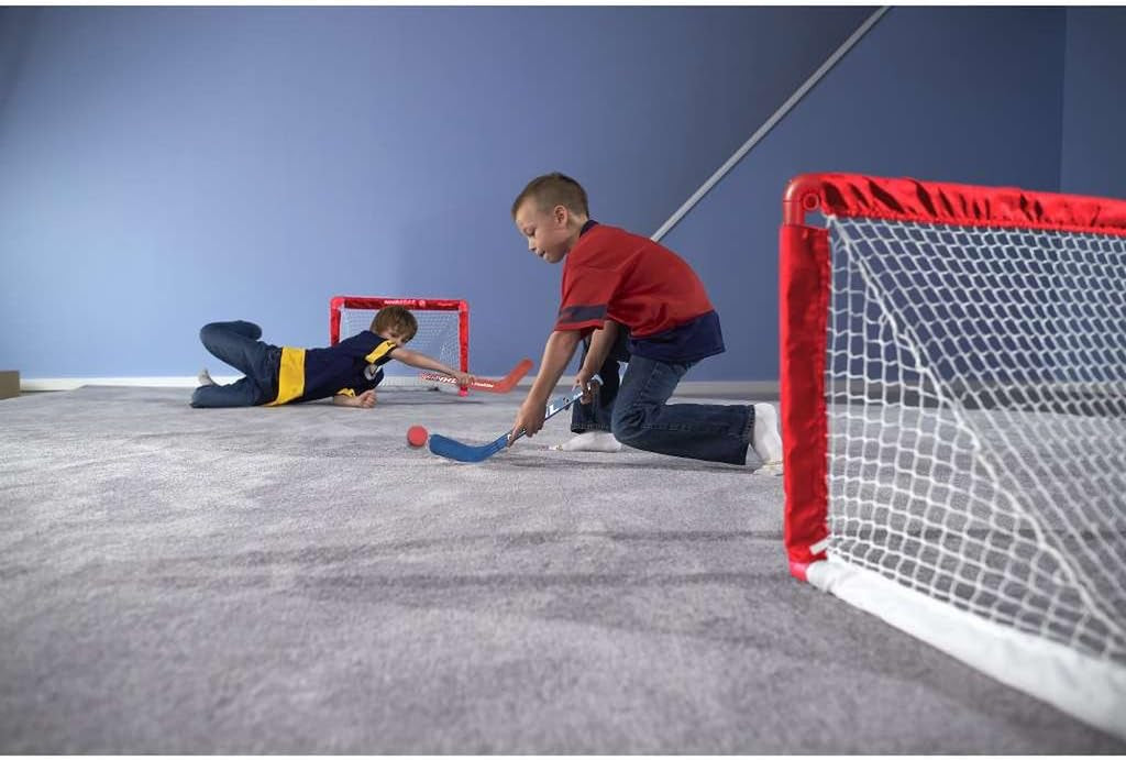 Franklin Sports NHL Kids Mini Hockey Goal Set - (2) Mini + Knee Hockey Goals, (4) Youth Sticks, (2) Goalie Sticks + (4) Foam Balls - Knee + Mini Hockey Set