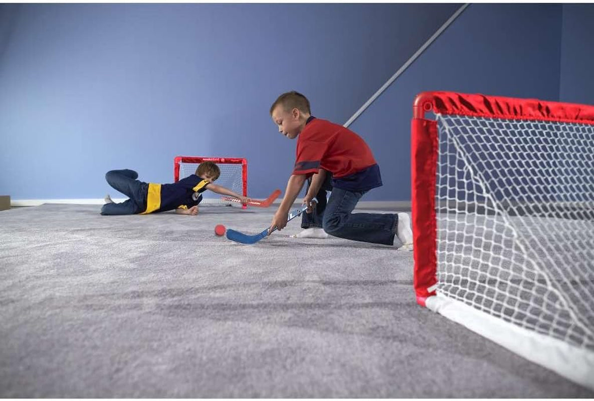 Franklin Sports NHL Kids Mini Hockey Goal Set - (2) Mini + Knee Hockey Goals, (4) Youth Sticks, (2) Goalie Sticks + (4) Foam Balls - Knee + Mini Hockey Set
