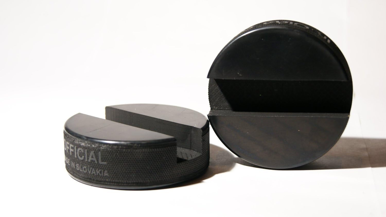 The Original Indestructible Hockey Puck Cell Phone Stand - Made from a Genuine Hockey Puck -Compatible for All Iphone/Samsung/Google/Lg Smartphones and More. (1 Pack)